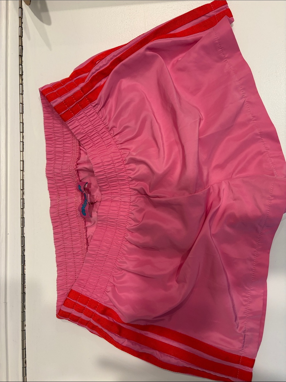 Edikted Women’s Pink Athletic Shorts with Red Trim